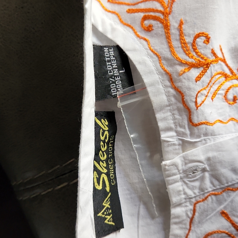 Size large long sleeve shirt with orange emphasis